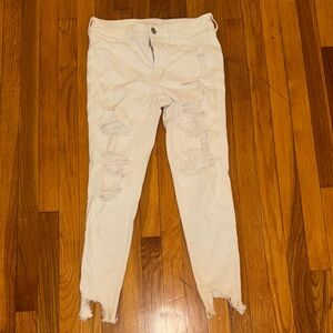 American Eagle Outfitters Cream Distressed Ankle Jeans